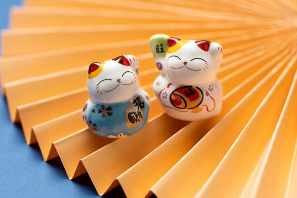 lucky-cats-with-yellow-paper-high-angle